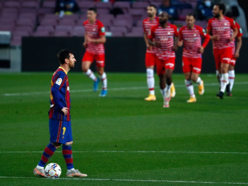 Granada fought back to beat Barcelona after Lionel Messi’s early goal (Joan Monfort/AP)
