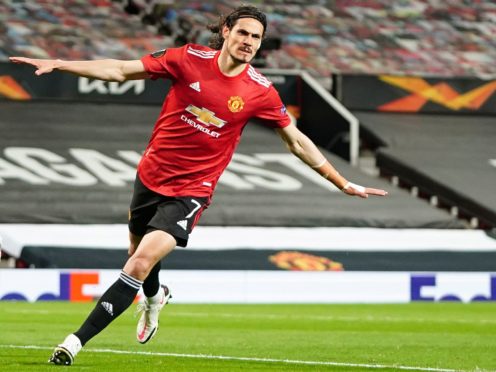 Edinson Cavani celebrates after scoring Manchester United’s second goal (Jon Super/AP)