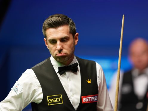 Mark Selby (pictured) was warned for slow play in his clash with Stuart Bingham (Zac Goodwin/PA)