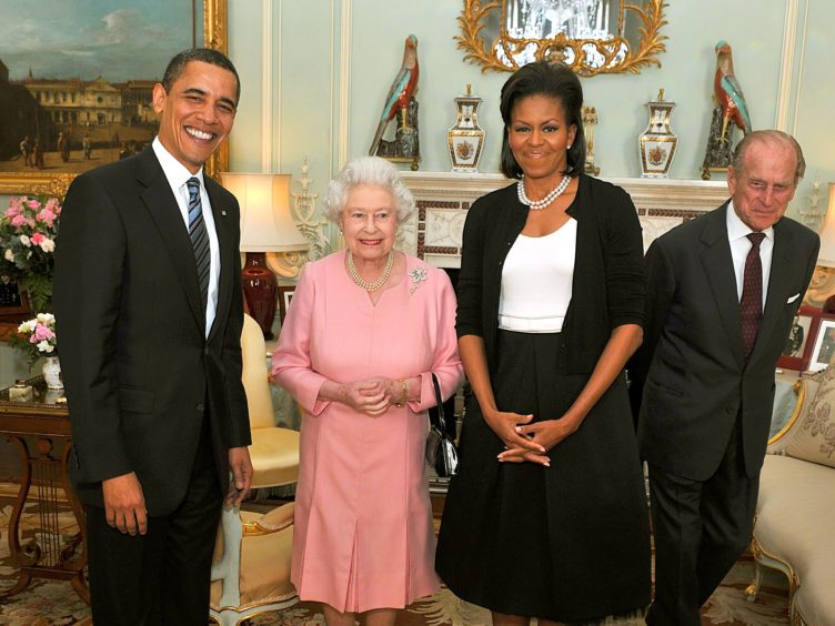 Barack and Michelle Obama with the Queen and the Duke of Edinburgh (JOhn Stillwell/PA)