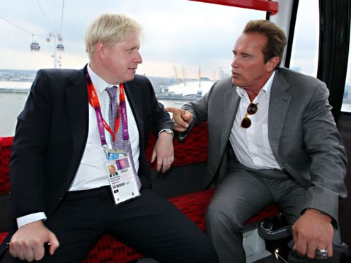 Boris Johnson with Arnold Schwarzenegger (PA)
