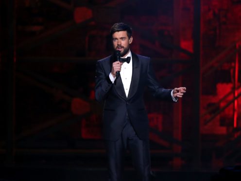 Jack Whitehall on stage at the Brit Awards 2020 (Isabel Infantes/PA)