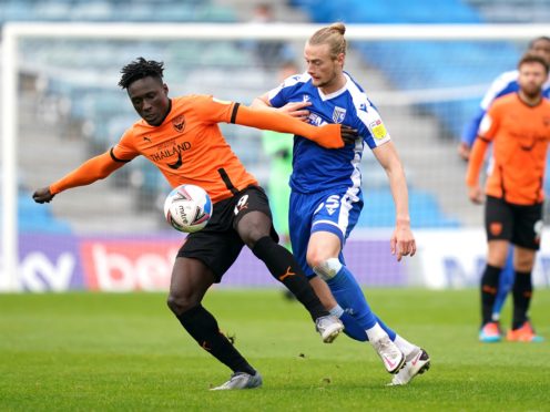 Dan Agyei, left, struck late on for Oxford (John Walton/PA)
