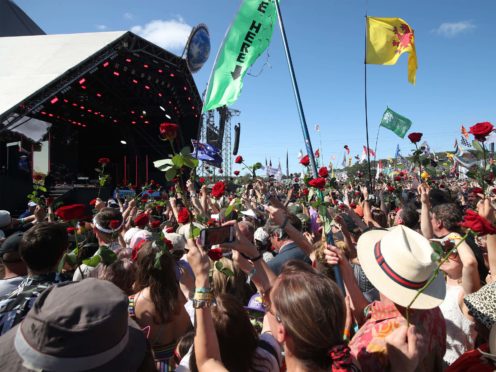 The regular Glastonbury Festival usually takes place in June and attracts around 200,000 people (Yui Mok/PA)