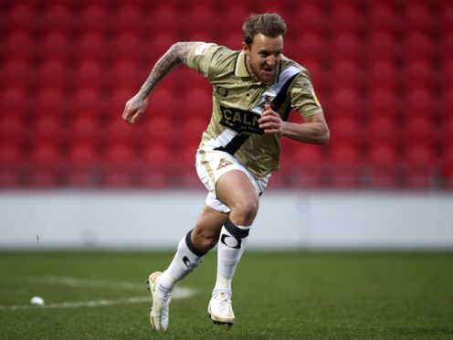 James Coppinger celebrates scoring for Doncaster (PA)