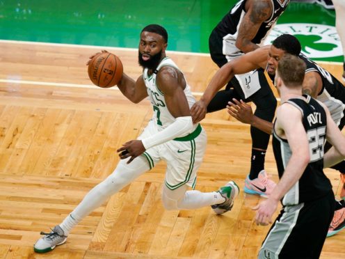 Boston Celtics guard Jaylen Brown (7) drives to the basket (Elise Amendola/AP)