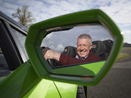 Scottish Liberal Democrat leader Willie Rennie drives a Lamborghini Huracan supercar at Ingliston Racing Circuit at the Royal Highland Centre, in Edinburgh (Jane Barlow/PA)