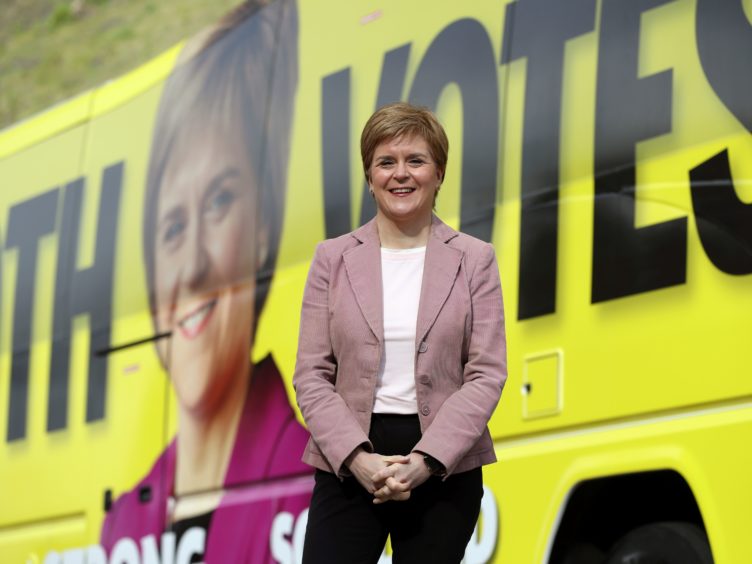 Nicola Sturgeon thanked the public for their efforts over the last year during the pandemic (Russell Cheyne/PA)