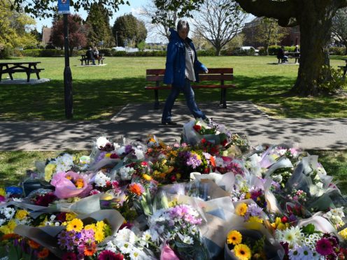 Floral tributes in a park in Aylesham village close to the scene in Snowdown, Kent, where the body of PCSO Julia James was found (Kirsty O’Connor/PA)
