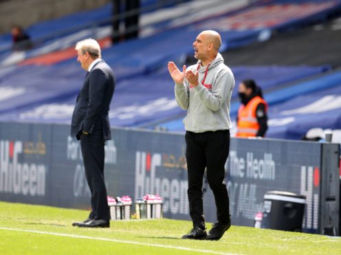 Pep Guardiola saw Manchester City take another step towards the title with a 2-0 win at Crystal Palace (Catherine Ivill/PA)