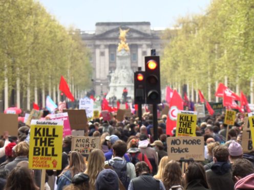 Demonstrators walk down the Mall during a ‘Kill The Bill’ protest (Renee Bailey/PA)