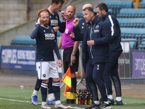 Gary Rowett, right, speaks to his team in front of an empty stand (Jonathan Brady/PA)
