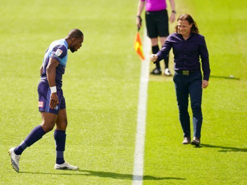 Uche Ikpeazu celebrates his goal with manager Gareth Ainsworth (Adam Davy/PA)