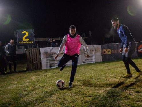 Players participate in the Midnight Ramadan League (Jacob King/PA)