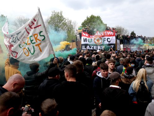 Fans protested outside the ground and some made it inside (Barrington Coombs/PA)