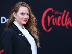 Emma Stone wore black and white as she walked the red carpet for the premiere of Cruella (Jordan Strauss/Invision/AP)