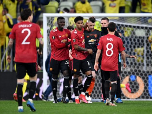 David de Gea is consoled by team-mates after missing the deciding spot-kick (Rafal Oleksiewicz/PA)