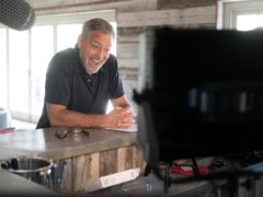 George Clooney looks excited to be pitching his legendary idea to family bakers in new advert that celebrates Warburtons dedication to baking the best quality (Warburtons/PA)