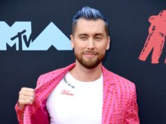 Former NSYNC singer Lance Bass revealed he and husband Michael Turchin are expecting twins (PA)