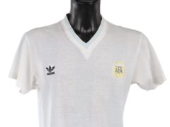 Match-worn tops once belonging to the late football superstar Diego Maradona were among a trove of sports memorabilia sold at auction (Julien’s Auctions/PA)