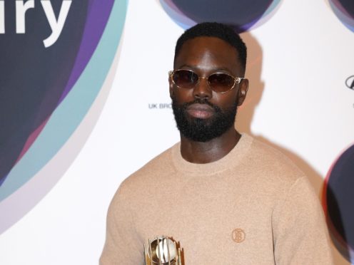 Ghetts holding the shortlist trophy during the announcement of the shortlist for the Hyundai Mercury Prize (Jonathan Brady/PA)