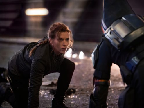This image released by Marvel Studios shows Scarlett Johansson in a scene from Black Widow. (Jay Maidment/Marvel Studios-Disney via AP)