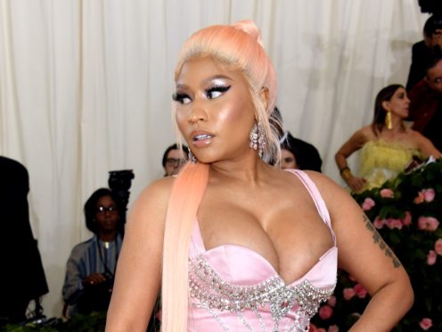 Rap superstar Nicki Minaj and her husband Kenneth Petty have been sued by the woman he was accused of raping in 1994 after allegedly harassing her to recant her story (Jennifer Graylock/PA)