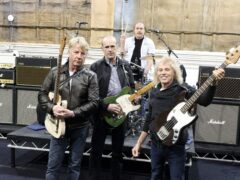 The original members of Status Quo, front from left, Rick Parfitt, Francis Rossi, Alan Lancaster and John Coghlan, rear (Steve Parsons/PA)