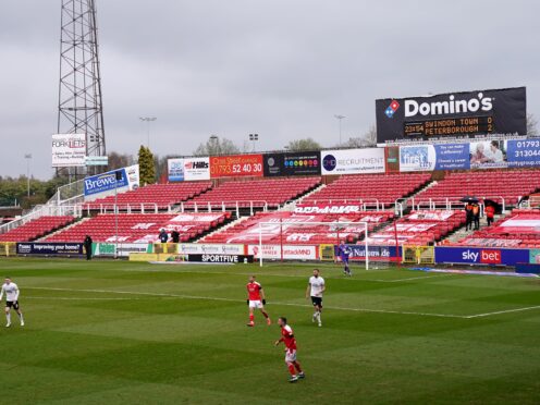 Swindon are back in action at The County Ground against Colchester (Tess Derry/PA)