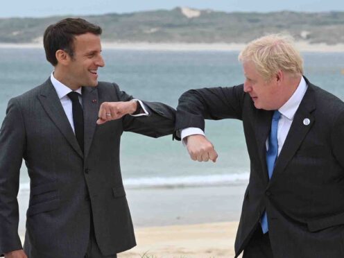 Boris Johnson with French president Emmanuel Macron at the G7 summit in Cornwall (Leon Neal/PA)