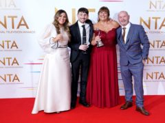 Sophie Sandiford, Pete Sandiford, Julie Malone and Tom Malone in the press room after winning the factual award for Gogglebox (Ian West/PA)