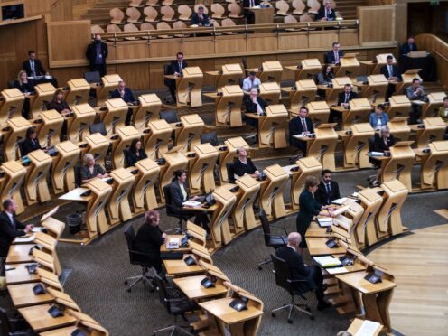 MSPs have backed the proposal to double the unpaid carers allowance this December (Andy Buchanan/PA)