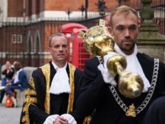 The new Lord Chancellor Dominic Raab (left) arrives at the Judges’ entrance to the Royal Courts of Justice (GaretH Fuller/PA)