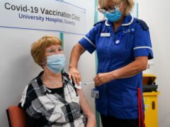 Margaret Keenan receives her booster shot from Julie Baines (Jacob King/PA)