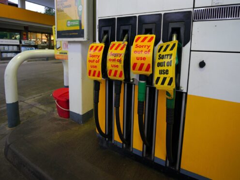 Drivers are being urged by the Government to ‘buy fuel as normal’ after the lorry driver shortage hit supplies (Peter Byrne/PA)