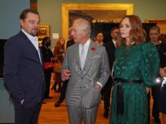 The Prince of Wales (centre) speaks with designer Stella McCartney (right) and Leonardo DiCaprio (Owen Humphreys/PA)