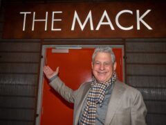 Sir Cameron Mackintosh in front of The Mack sign in London’s newest theatre (Aaron Chown/PA)