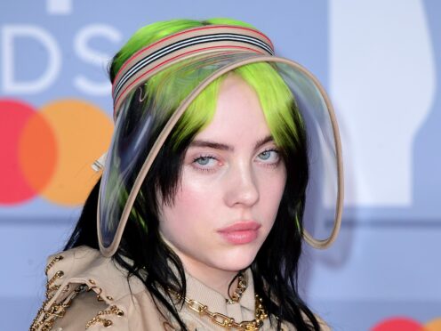 Vegan Billie Eilish pushed for designer Oscar de la Renta to stop using fur and made history when the Met Gala exclusively served vegan meals (IAn West/PA)