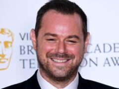 File photo dated 12/05/19 of Danny Dyer at the Virgin Media BAFTA TV awards, who has praised his wife for always managing to “shine” as he wished her a happy birthday. The actor said he and Joanne Mas have been “bouncing through life together for over 30 years now”. EastEnders star Dyer and Mas have been married since 2016 after she proposed to him on Valentine’s Day. The couple share children Dani, Sunnie and Arty.