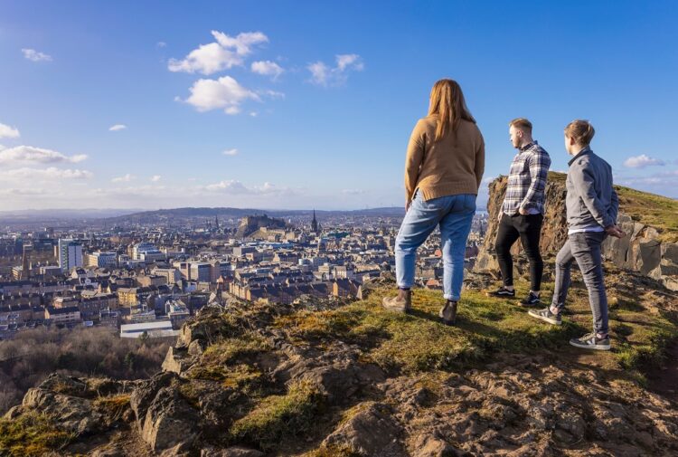 People standing on Salisbury Crags in Edinburgh