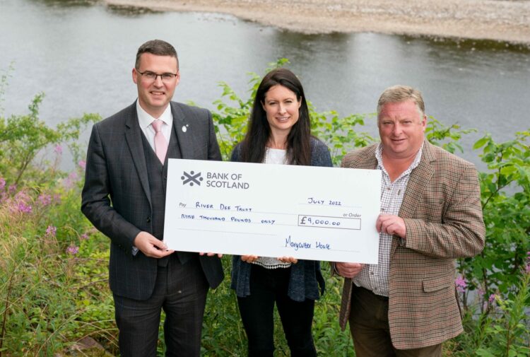Maryculter House gives the River Dee Trust a big cheque