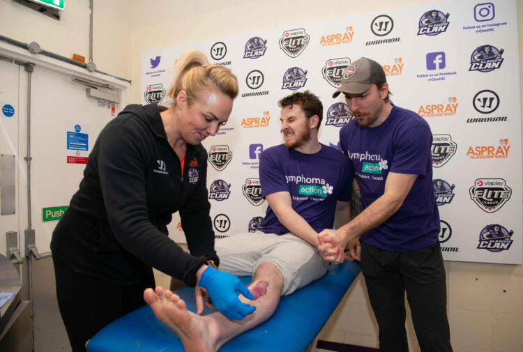 Glasgow Clan players being waxed