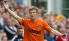 Paul Dixon in action for Dundee United.