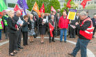 Unite The Unions, Unison and other supporters attend a demonstrate outside Fife House.