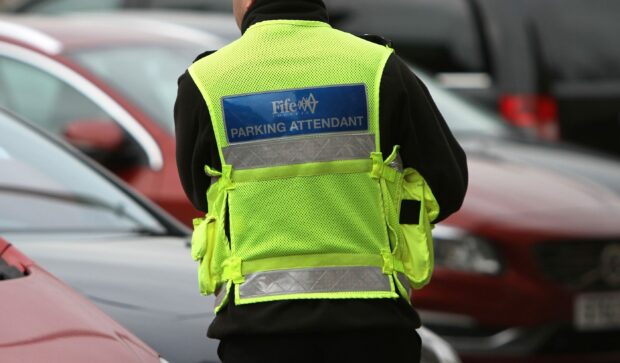 A parking attendant in Fife was abused.