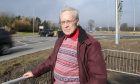 Pictured beside the Balfarg junction on the A92 near Glenrothes is Ron Page (convenor of the Glenrothes Area Furures Group) who is campaigning for safety improvements to the road