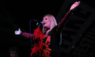 Image shows Cherry Bombz band on stage.