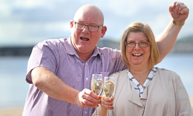 Jim and Pam Forbes from Tayport celebrate their 2017 win. Image: Kris Miller/DC Thomson
