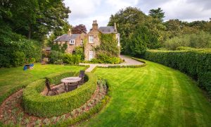 Balmuirfield House enjoys a stunning setting beside the Dighty Burn. Image: Supplied
