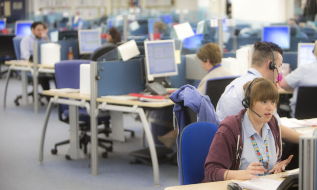 Staff at work in a call centre. (file pic)
